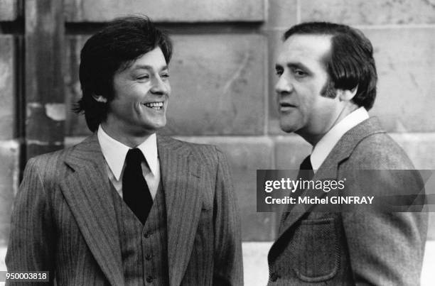 Alain Delon et Jean Yanne sur le tournage du film 'Armaguedon' réalisé par Alain Jessua le 7 octobre 1976 à Paris, France.
