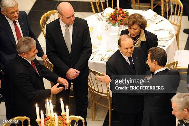 France's President Nicolas Sarkozy , Algerian President Abdelaziz Bouteflika , Brazilian President Luiz Inacio Lula da Silva greet each other as...