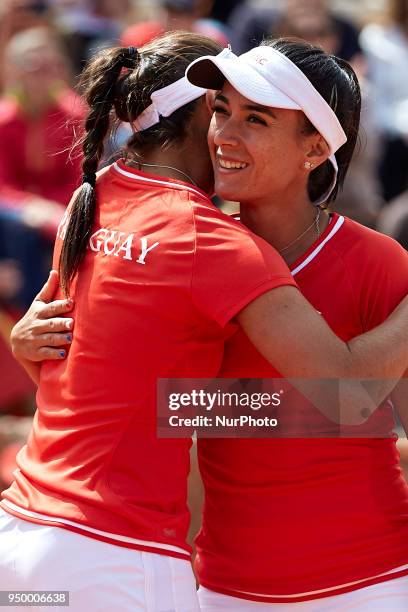 Veronica Cepede of Paraguay celebrates the victory with her teammate Montserrat Gonzalez in their doubles match against Georgina Garca Perez and...