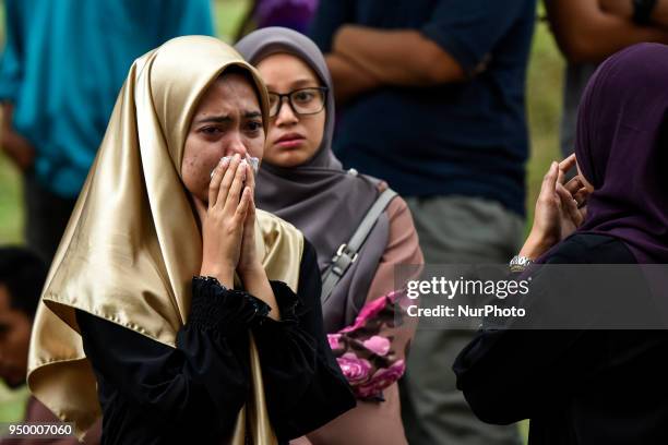 Universiti Kuala Lumpur British Malaysian Institute students cry bitterly after they see a dead body of their lecture, Fadi Mohammad al-Batsh at...