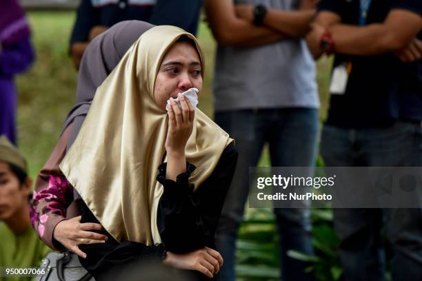 Universiti Kuala Lumpur British Malaysian Institute students cry bitterly after they see a dead body of their lecture, Fadi Mohammad al-Batsh at...