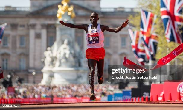 Eliud Kipchoge of Kenya crosses the finish line to win the elite men's race during the Virgin Money London Marathon at United Kingdom on April 22,...