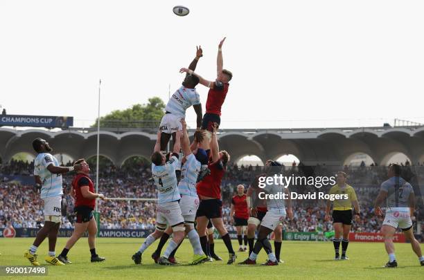 Yannick Nyanga of Racing 92 is challenged by Jack O'Donoghue in the lineout during the European Rugby Champions Cup Semi-Final match between Racing...