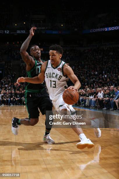 Malcolm Brogdon of the Milwaukee Bucks handles the ball against the Boston Celtics in Game Four of Round One of the 2018 NBA Playoffs on April 22,...