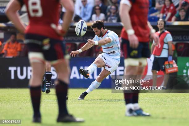 Racing 92's French scrum-half Maxime Machenaud kicks the ball during the European Champions Cup semi-final rugby union match between Racing 92 and...