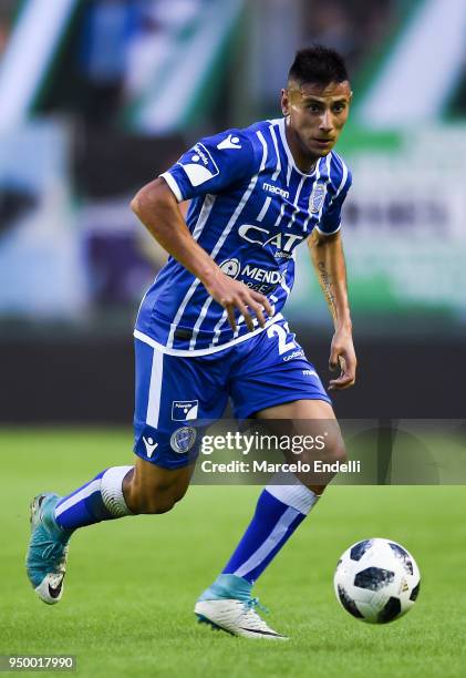 Fabrizio Angileri of Godoy Cruz drives the ball during a match between Banfield and Godoy Cruz as part of Argentina Superliga 2017/18 at Florencio...