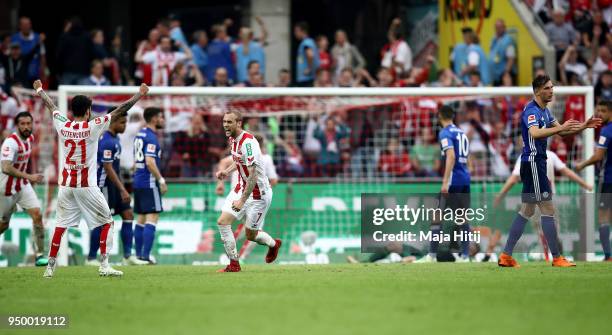 Marcel Risse of Koeln celebrates after he scores the 2nd goal during the Bundesliga match between 1. FC Koeln and FC Schalke 04 at...