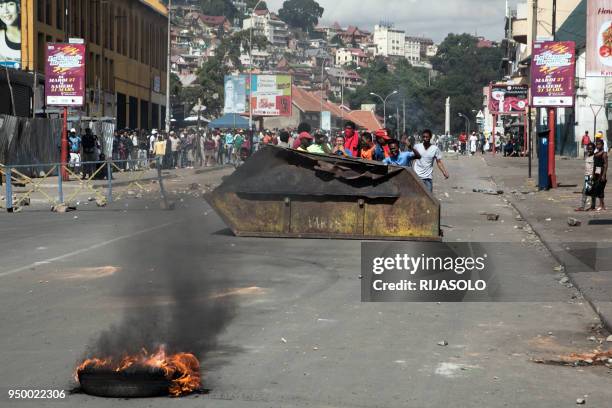 Few hundred people gather in the centre of Antananarivo on April 22, 2018 to erect a roadblock, during a rally to protest against the new electoral...