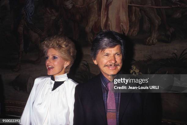 Charles Bronson et son épouse Jill Ireland à Paris en 1984, France.