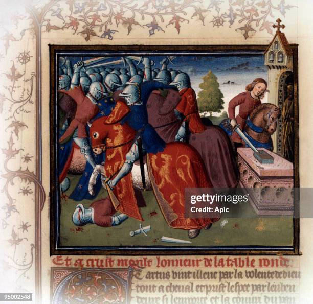 Arthurian legend : young Arthur removing the sword Excalibur from the anvil, illumination by the 'Maitre des Cleres Femmes' from 'Histoire de...