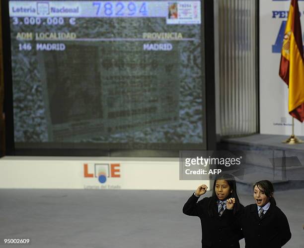 Children from the San Ildefonso school anounce the winning number of Spain's Christmas lottery named "El Gordo" in Madrid on December 22, 2009....