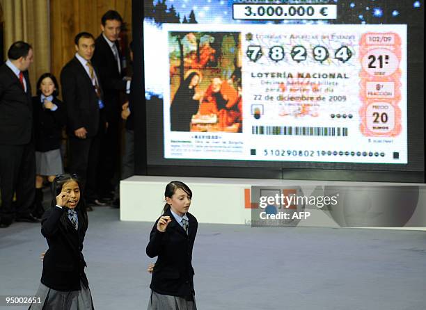 Children from the San Ildefonso school anounce the winning number of Spain's Christmas lottery named "El Gordo" in Madrid on December 22, 2009....