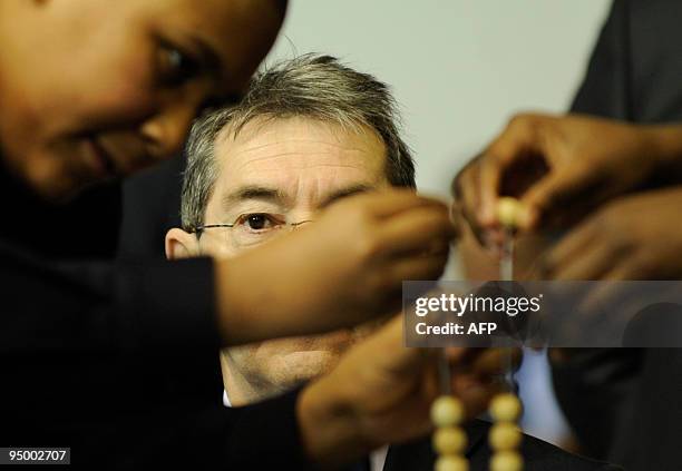 Children from the San Ildefonso school take part in the draw of the winning numbers of Spain's Christmas lottery named "El Gordo" in Madrid on...