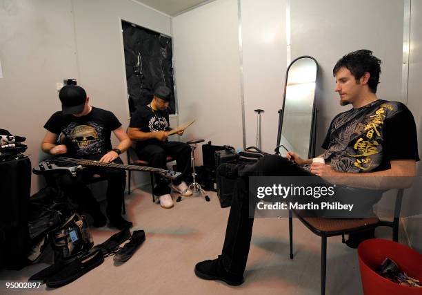 Gareth McGrillen, Paul Kodish and Rob Swire of Pendulum pose backstage in the dressing room at the Homebush Olympic Venue during Big Day Out Sydney...