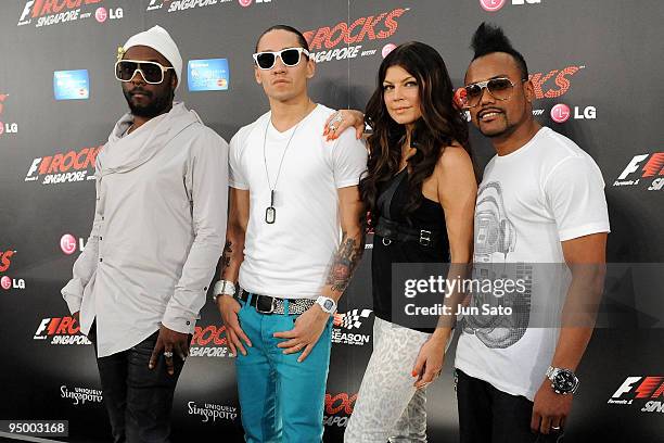 Wil.i.am, Taboo, Fergie and apl.de.ap of Black Eyed Peas attend a photocall on day 3 of F1 Rocks Singapore concert at Fort Canning Park on September...