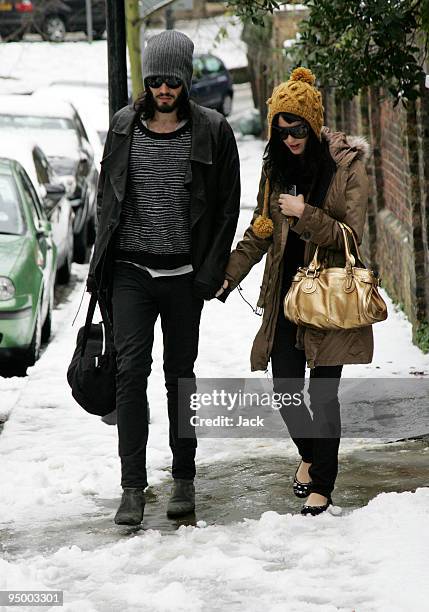 Russell Brand and Katy Perry leaving Brand's home in Hampstead on December 22, 2009 in London, England.