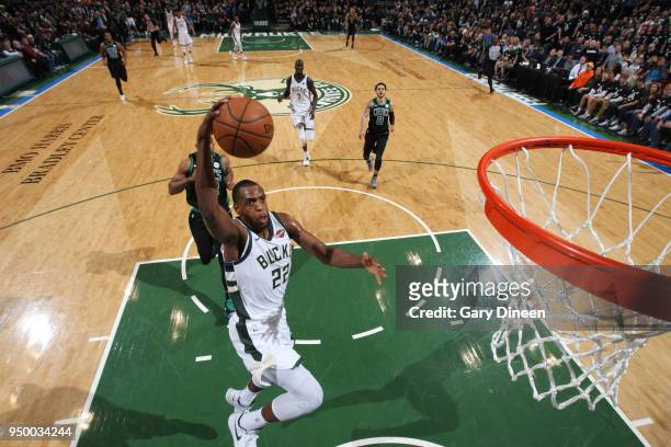 Khris Middleton of the Milwaukee Bucks goes to the basket against the Boston Celtics in Game Four of Round One of the 2018 NBA Playoffs on April 22,...