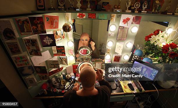 Christopher Biggins prepares for his role as panto dame Widow Twankey at the Theatre Royal Plymouth's production of Aladdin on December 22, 2009 in...