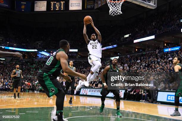 Milwaukee, WI Khris Middleton of the Milwaukee Bucks shoots the ball against the Boston Celtics in Game Four of Round One of the 2018 NBA Playoffs on...