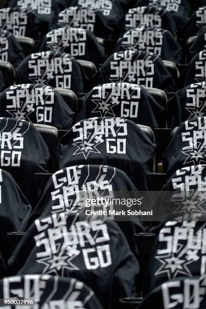 Shirts are laid out for fans before Game Four of the Western Conference Quarterfinals between the Golden State Warriors and the San Antonio Spurs...