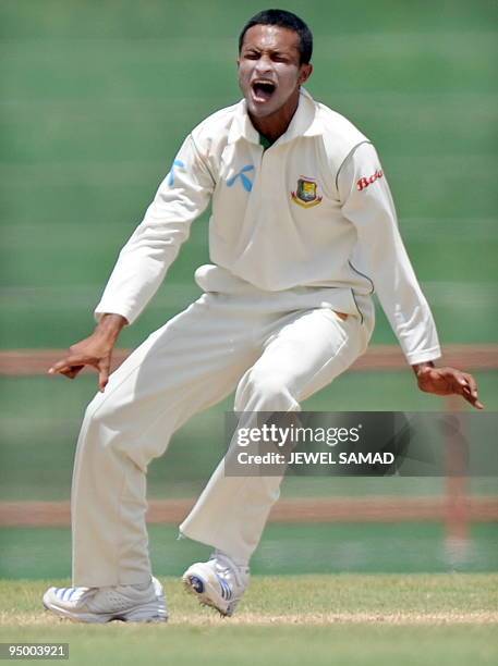 Bangladeshi cricketer Shakib Al Hasan celebrates after dismissig West Indies batsman Omar Phillips during the final day of the first Test match...