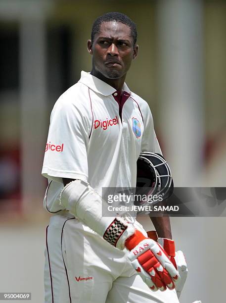 West Indies batsman Omar Phillips leaves the field after being dismissed off Bangladeshi bowler Shakib Al Hasan during the final day of the first...