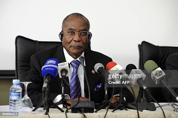 Jose Maria Botelho de Vasconcelos, President of the OPEC Conference and Angolan Minister of Petroleum gives a press conference in Luanda on December...
