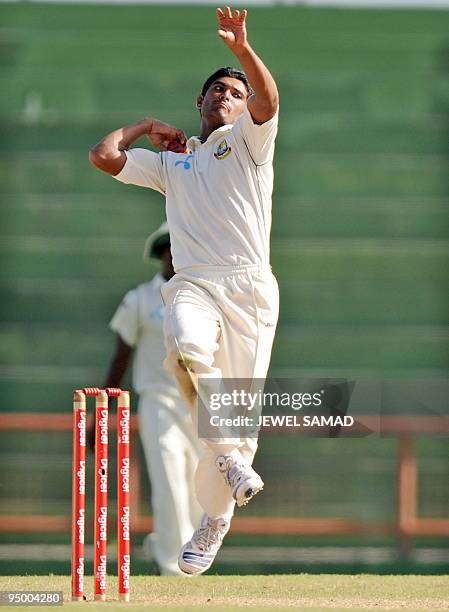 Bangladeshi cricketer Mahmudullah delivers the ball during the final day of the first Test match between West Indies and Bangladesh at the Arnos Vale...