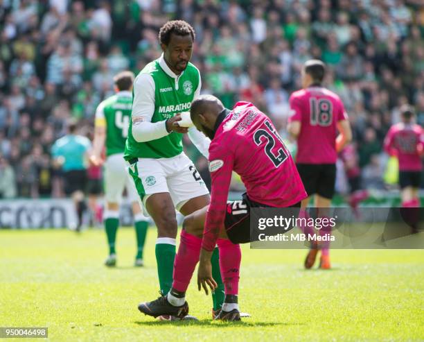 Sporting gesture as Hibs' Nigerian defender, Efe Ambrose helps Celtic midfielder, Olivier Ntcham to his feet as Hibernian play host to Celtic in the...