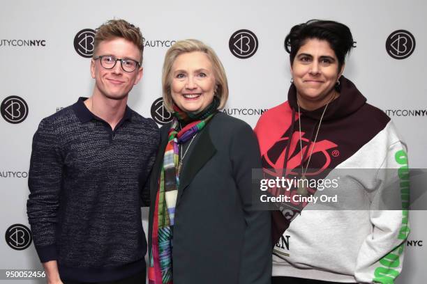 Tyler Oakley, Hillary Clinton and Beautycon Founder Moj Mahdara attend Beautycon Festival NYC 2018 - Day 2 at Jacob Javits Center on April 22, 2018...