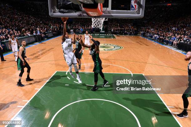 Milwaukee, WI Khris Middleton of the Milwaukee Bucks shoots the ball against the Boston Celtics in Game Four of Round One of the 2018 NBA Playoffs on...