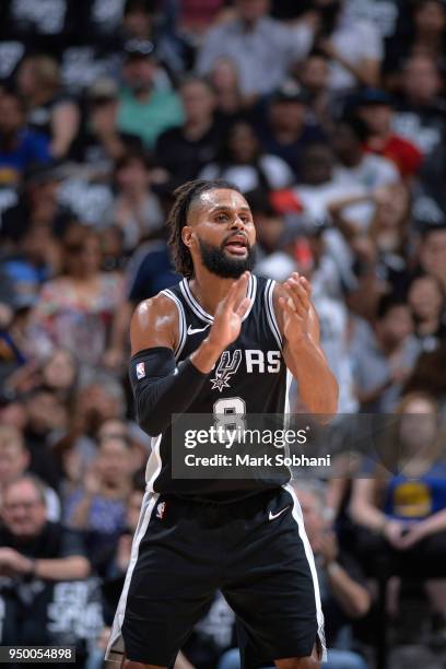 Patty Mills of the San Antonio Spurs reacts to a play in Game Four of the Western Conference Quarterfinals against the Golden State Warriors during...