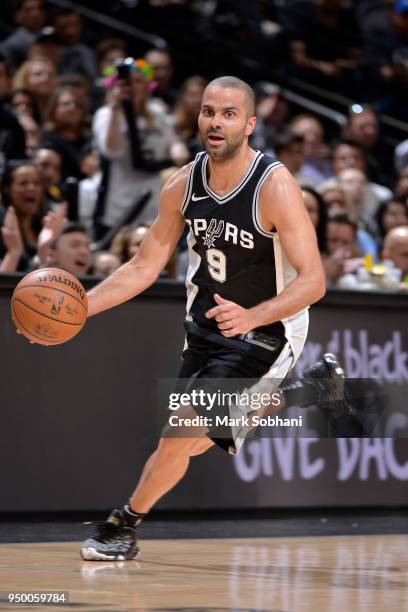 Tony Parker of the San Antonio Spurs handles the ball against the Golden State Warriors in Game Four of the Western Conference Quarterfinals during...