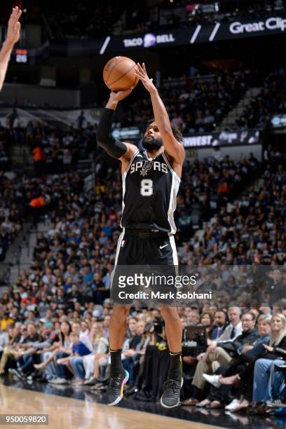 Patty Mills of the San Antonio Spurs shoots the ball against the Golden State Warriors in Game Four of the Western Conference Quarterfinals during...