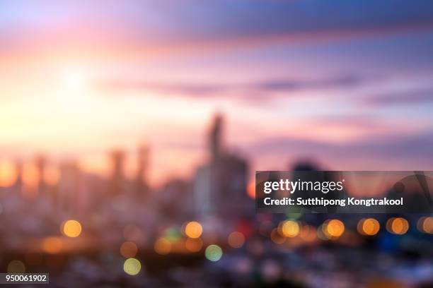 blur background of landmark bangkok city. skyline view of modern building in business district with sunrise at bangkok city, thailand. hotel and resident district in the capital city of thailand - sunset city stock pictures, royalty-free photos & images