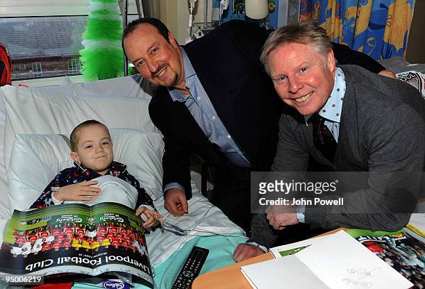 Manager of Liverpool Rafael Benitez and assistant manager Sammy Lee go to visit Thomas at Alder Hey Children's Hospital on December 22, 2009 in...