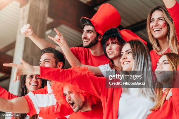 fans at stadium together - awards party 2018 stock pictures, royalty-free photos & images