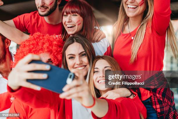 fans at stadium together - awards party 2018 stock pictures, royalty-free photos & images