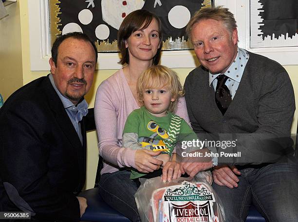 Manager of Liverpool Rafael Benitez and assistant manager Sammy Lee go to visit James at Alder Hey Children's Hospital on December 22, 2009 in...