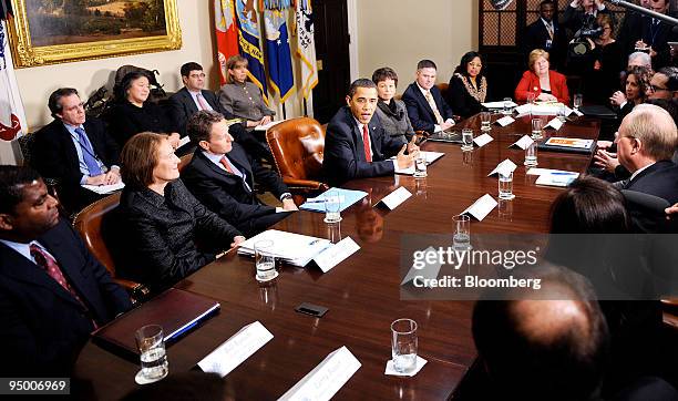 President Barack Obama speaks during a meeting with executives of a dozen community banks and Timothy Geithner, U.S. Treasury secretary, third from...