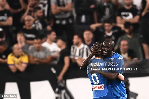 Napoli's French defender Kalidou Koulibaly celebrates with teammate Italian midfielder Jorginho after scoring a goal during the Italian Serie A...