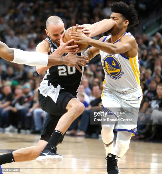 Manu Ginobili of the San Antonio Spurs drives on Quinn Cook of the Golden State Warriors during the first half of Game Four of Round One of the 2018...
