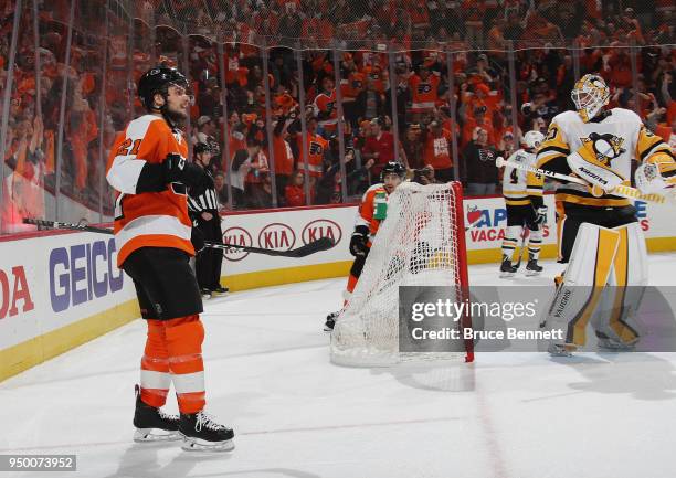 Scott Laughton of the Philadelphia Flyers celebrates his second period goal against Matt Murray of the Pittsburgh Penguins in Game Six of the Eastern...