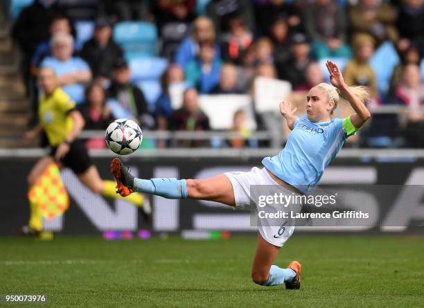 Steph Houghton of Manchester City stretches for the ball during the UEFA Women's Champions League Semi Final First Leg match between Manchester City...