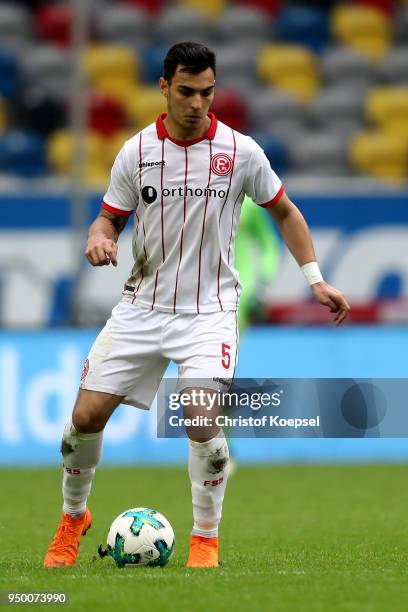 Kaan Ayhan of Duesseldorf runs with the ball during the Second Bundesliga match between Fortuna Duesseldorf and FC Ingolstadt 04 at Esprit-Arena on...