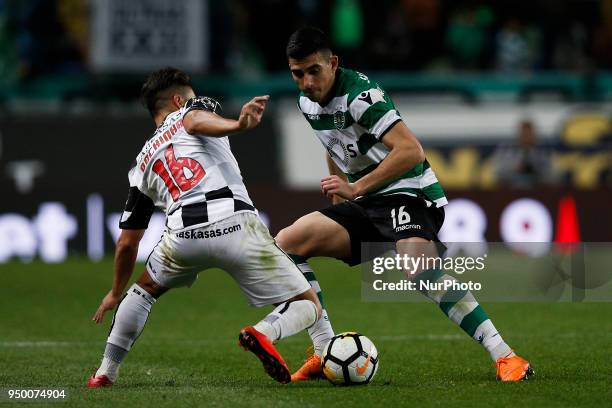 Sporting's midfielder Rodrigo Battaglia vies for the ball with Boavista's midfielder Rochinha during Primeira Liga 2017/18 match between Sporting CP...