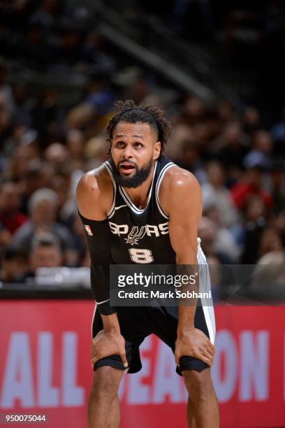 Patty Mills of the San Antonio Spurs looks on in Game Four of the Western Conference Quarterfinals against the Golden State Warriors during the 2018...