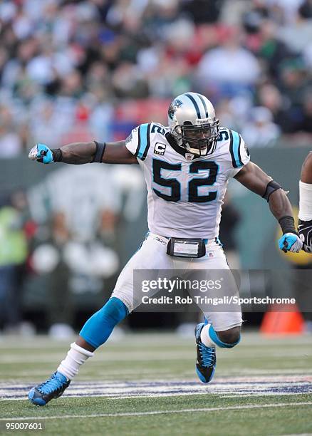 Jon Beason of the Carolina Panthers defends against the New York Jets at Giants Stadium on November 29, 2009 in East Rutherford, New Jersey. The Jets...