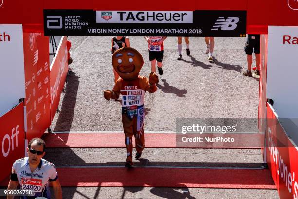 Runners dress in fancy costumes to fundraise money for charities during the Virgin Money London Marathon in London, England on April 22, 2018.