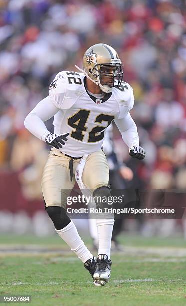 Darren Sharper of the New Orleans Saints defends against the Washington Redskins at FedExField on December 6, 2009 in Landover, Maryland. The Saints...